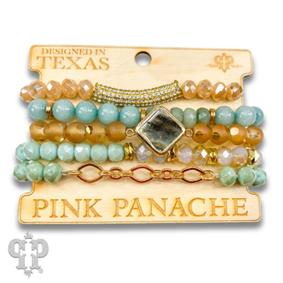 Five strand bead bracelet stack with charms