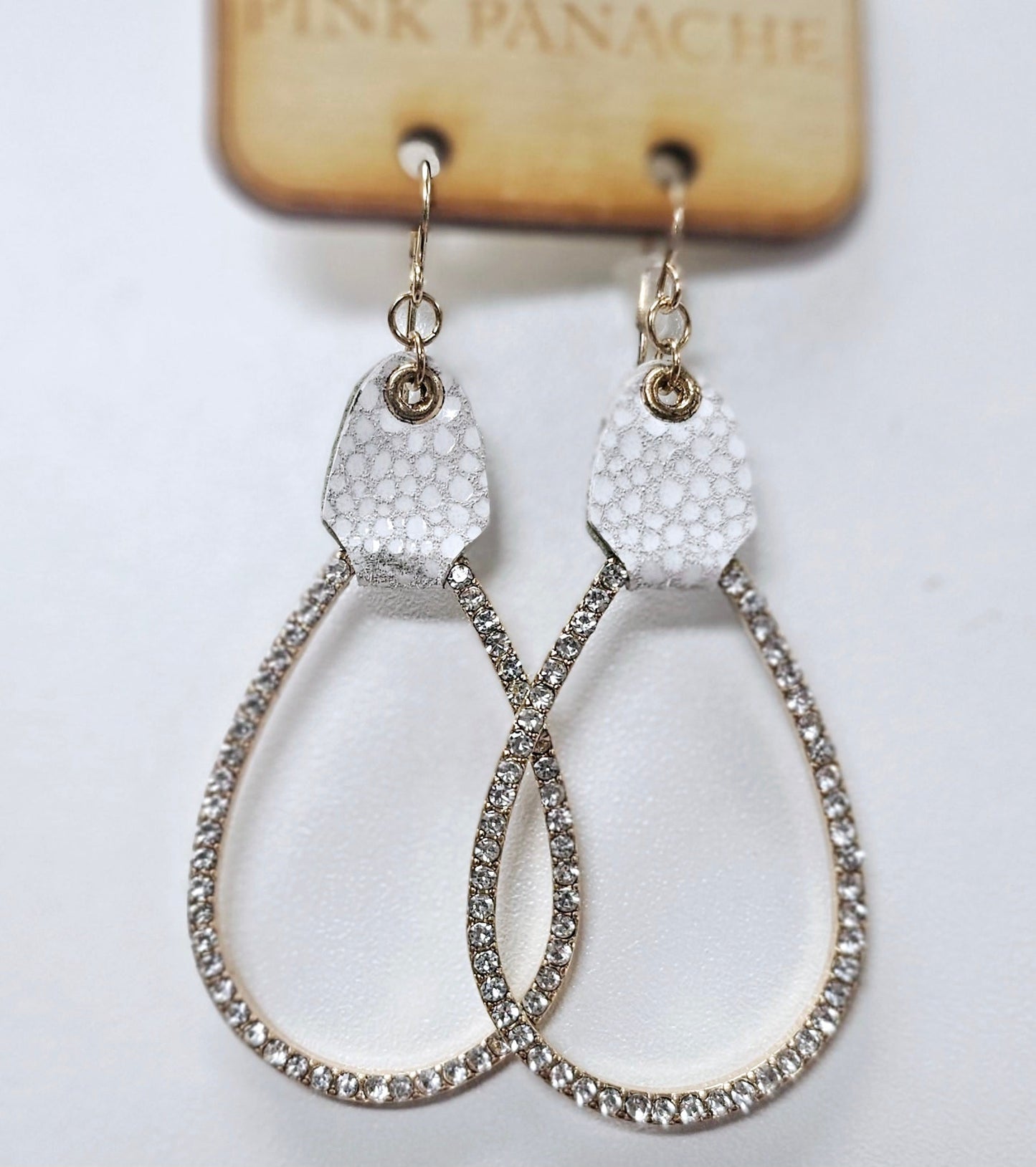 Silver base crystal teardrop, white leather earring, last call