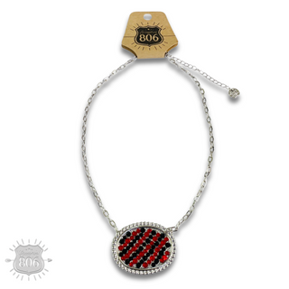 Rhinestone filled oval necklace