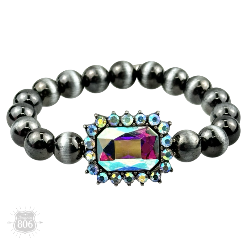 Navajo style burnished beaded bracelet, rhinestone charm