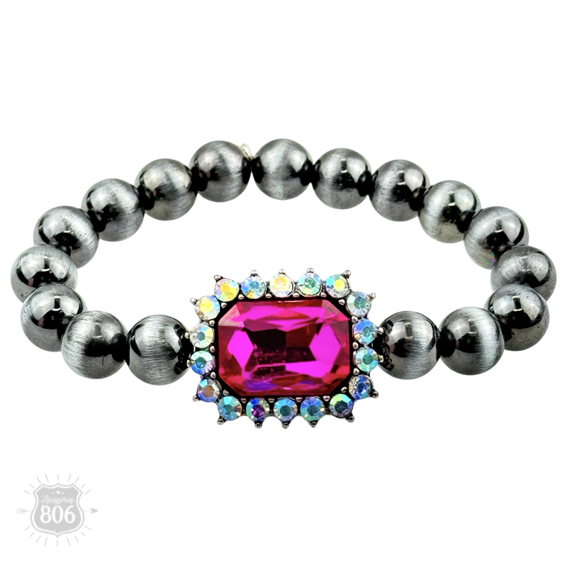 Navajo style burnished beaded bracelet, rhinestone charm