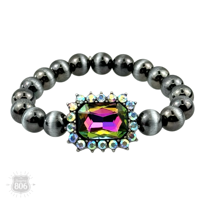 Navajo style burnished beaded bracelet, rhinestone charm