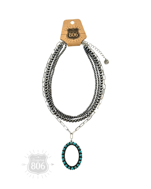 Burnished silver necklace, oval stone pendant