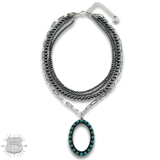 Burnished silver necklace, oval stone pendant