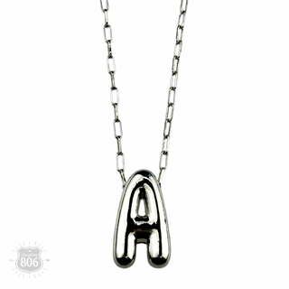 Silver letter pendant on necklace, initial monogram