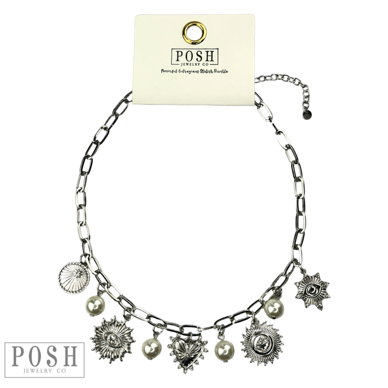 Protection charms and pearl drop necklace