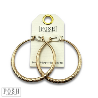 Textured metal hoop earring