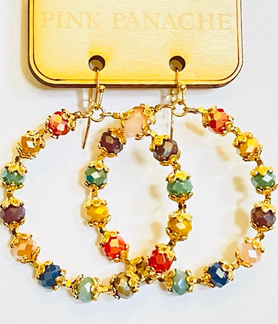 Faceted bead capped circle earring
