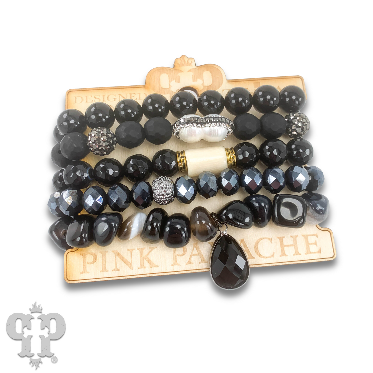 Five strand bead bracelet stack with charms