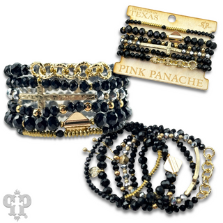 Mixed charm and bead multi strand bracelet