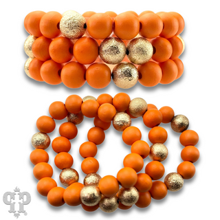 Three strand orange bead bracelet