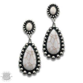 Stone teardrop in silver setting earring