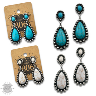 Stone teardrop in silver setting earring