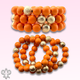 Three strand orange bead bracelet