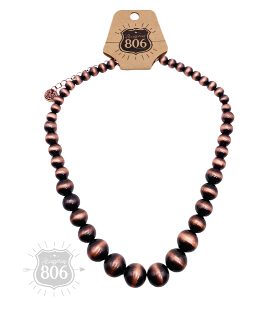 Graduated copper burnished bead necklace