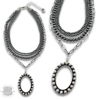 Burnished silver necklace, oval stone pendant