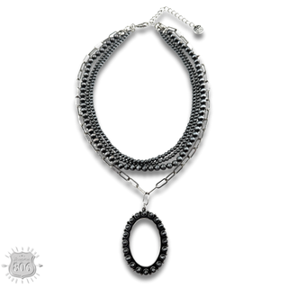 Burnished silver necklace, oval stone pendant