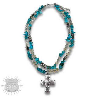Textured cross pendant on chip stone double strand necklace