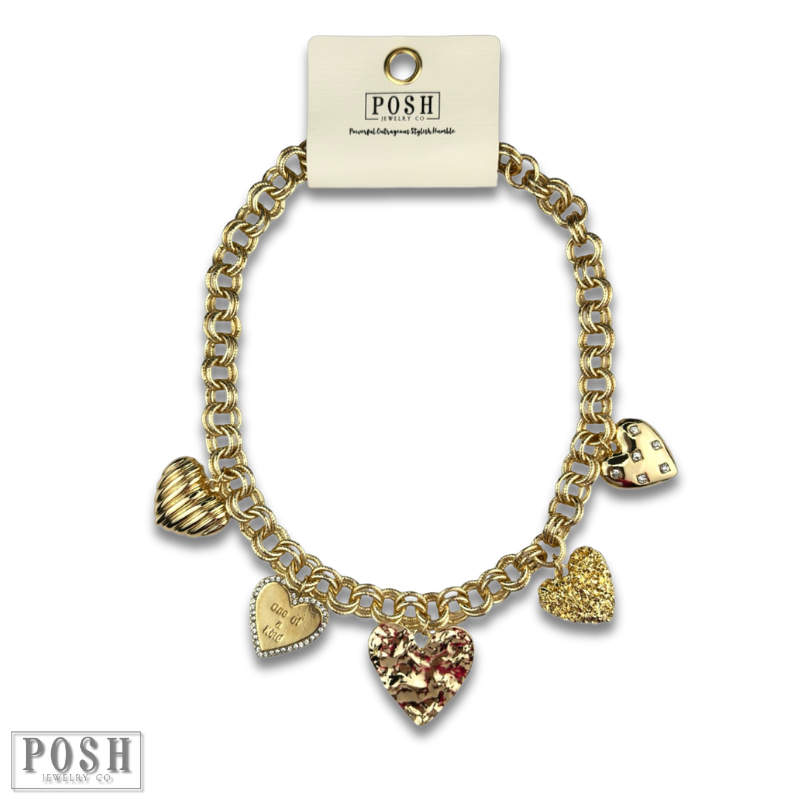 Gold heart charm necklace