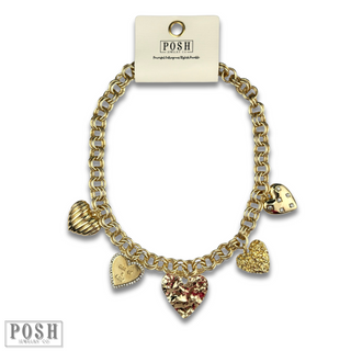 Gold heart charm necklace
