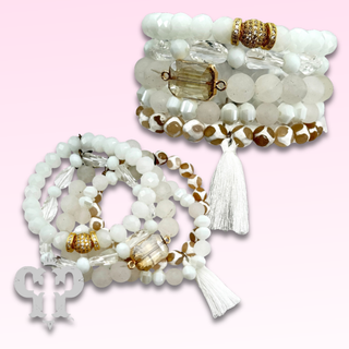 Five strand bead bracelet stack with charms