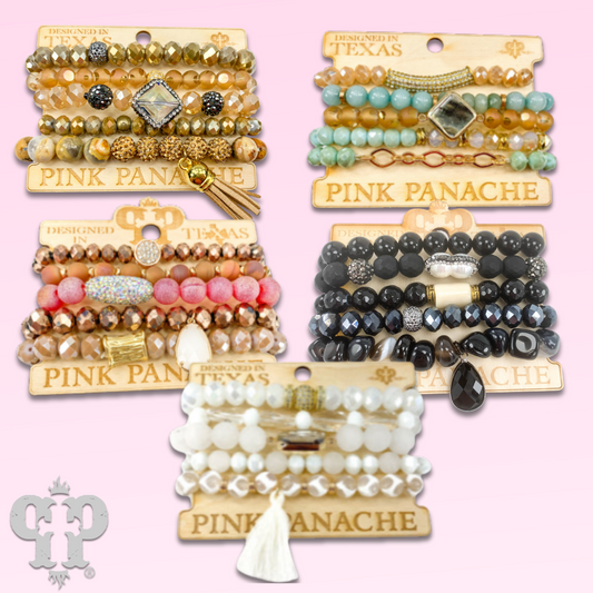 Five strand bead bracelet stack with charms