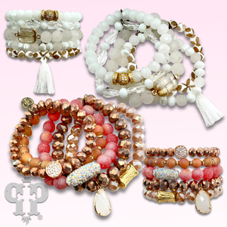Five strand bead bracelet stack with charms