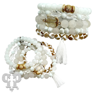 Five strand bead bracelet stack with charms