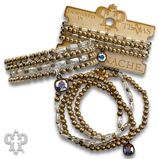 Gold and tube bead bracelet set with with crystal from Swarovski®