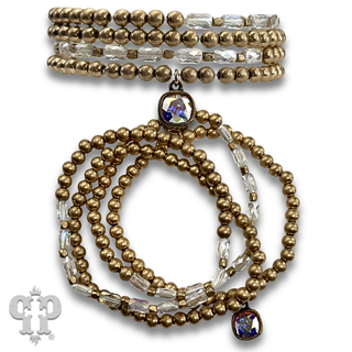 Gold and tube bead bracelet set with with crystal from Swarovski®