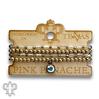 Gold and tube bead bracelet set with with crystal from Swarovski®