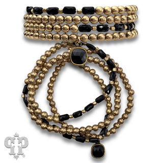 Gold and tube bead bracelet set with with crystal from Swarovski®