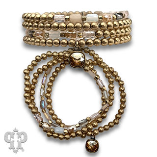 Gold and tube bead bracelet set with with crystal from Swarovski®