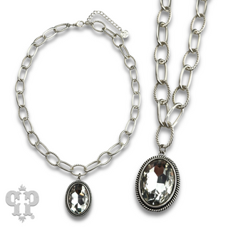 Large oval crystal pendant on chunky chain necklace