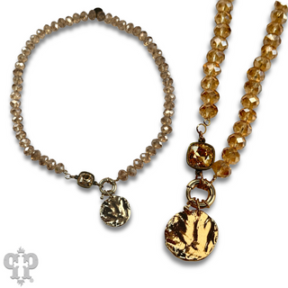 Gold disc necklace with Austrian crystal