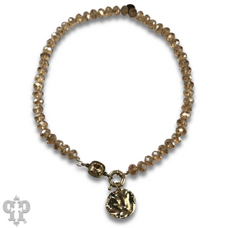 Gold disc necklace with Austrian crystal