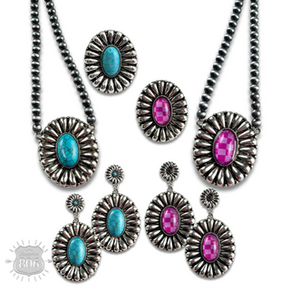 Western sunburst pendant on burnished silver bead necklace