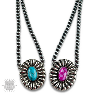 Western sunburst pendant on burnished silver bead necklace