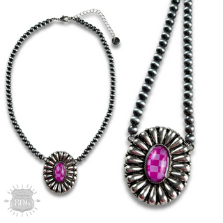 Western sunburst pendant on burnished silver bead necklace