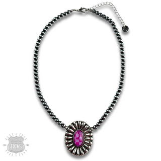 Western sunburst pendant on burnished silver bead necklace