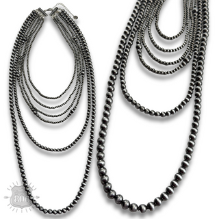 Western mixed size silver bead necklace