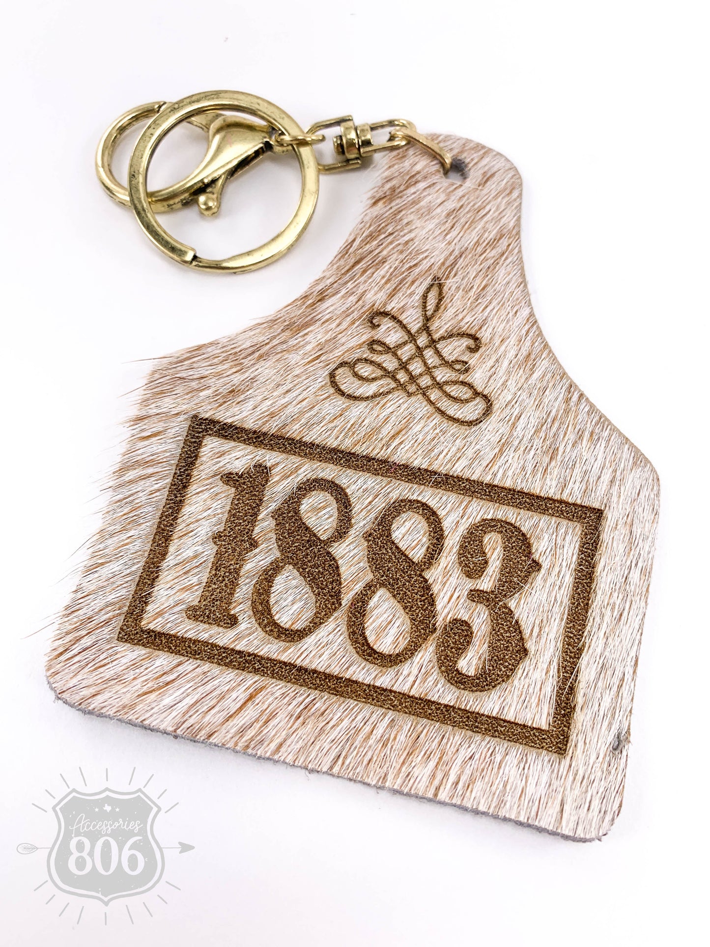 1883 boot stitch ear tag keychain, last call