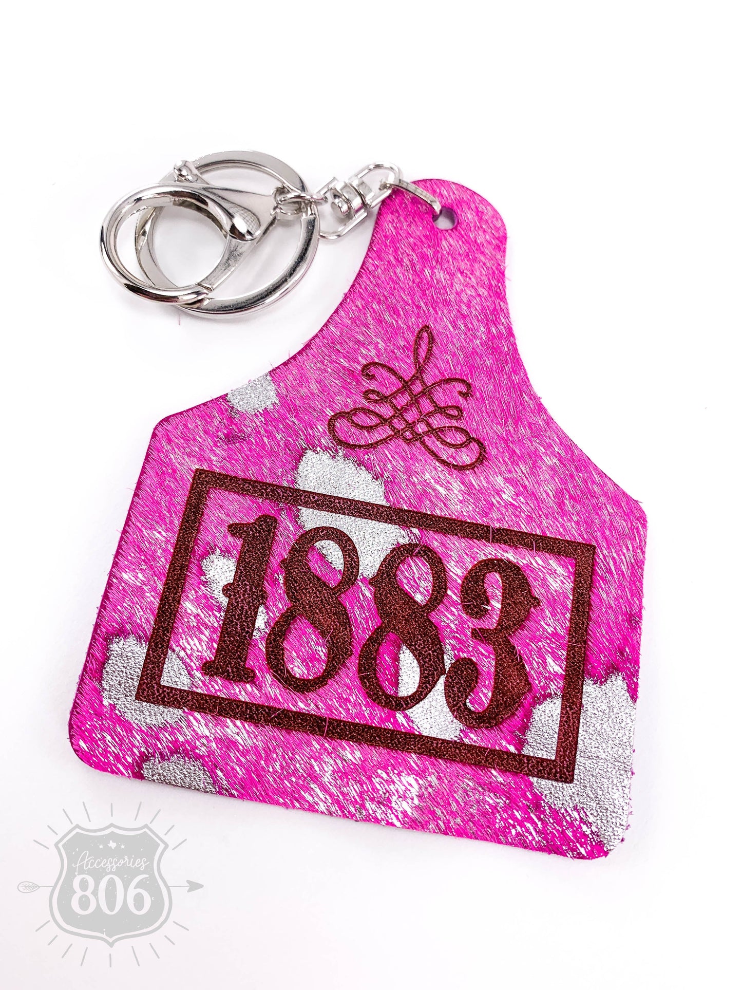 1883 boot stitch ear tag keychain, last call