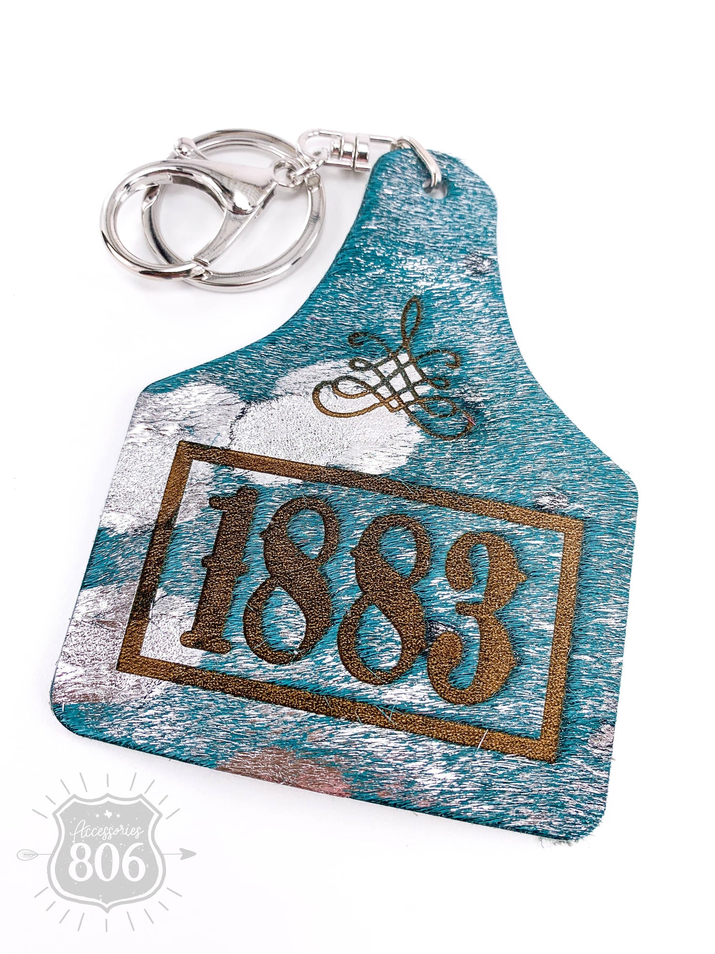 1883 boot stitch ear tag keychain, last call