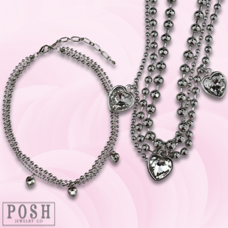 Three strand rhinestone heart charm necklace