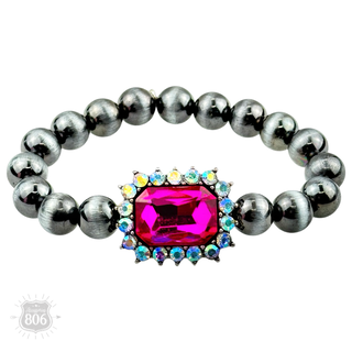 Navajo style burnished beaded bracelet, rhinestone charm