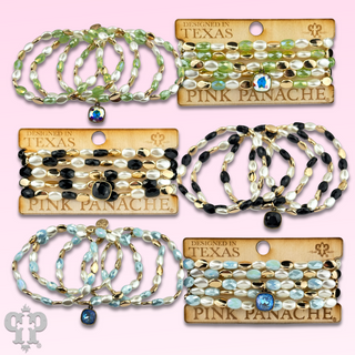 Glass and acrylic oval bead bracelet set with Austrian crystal charm