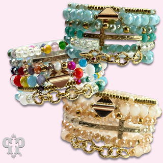 Mixed charm and bead multi strand bracelet
