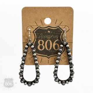 Stone and burnished silver earring