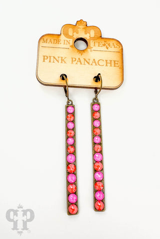 Neon orange and neon pink on bronze